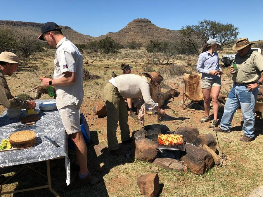 A group meal out on the farm in the Karoo veld