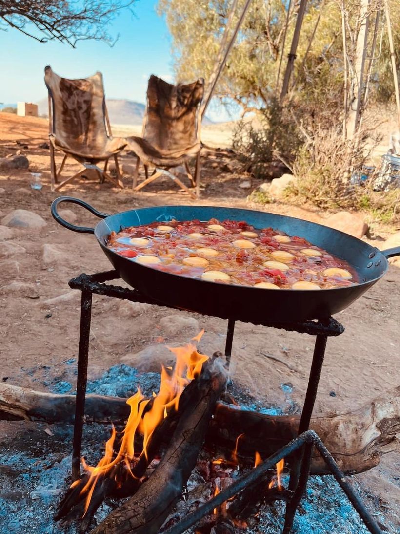 Cooking over the open campfire on the farm