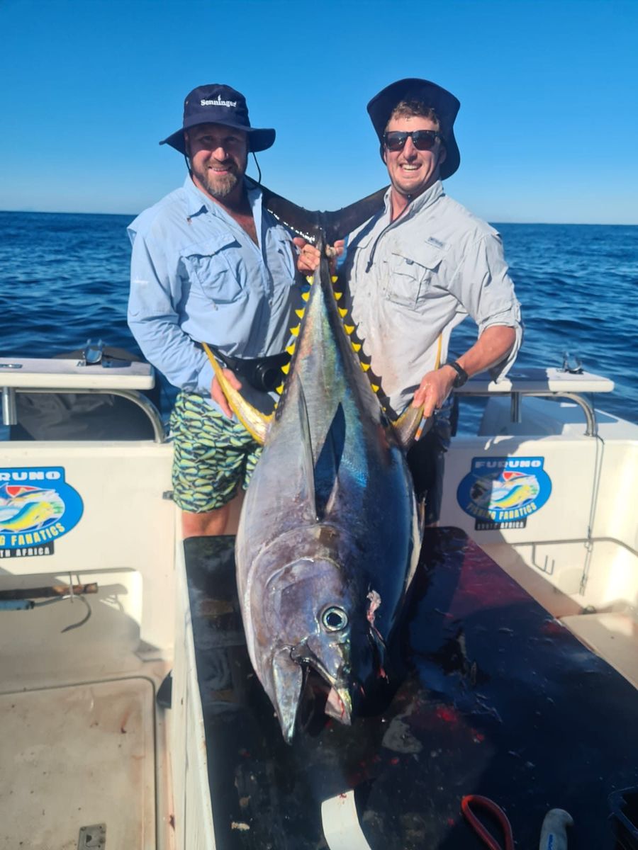 Two anglers with a tuna off Cape Point