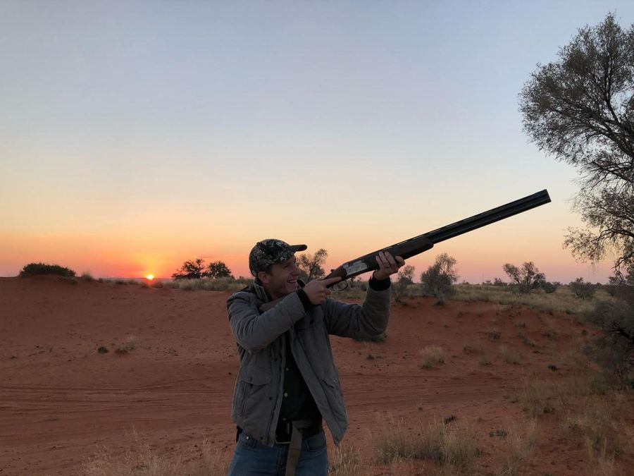 Wing shooting at sunset in the red Karoo sands